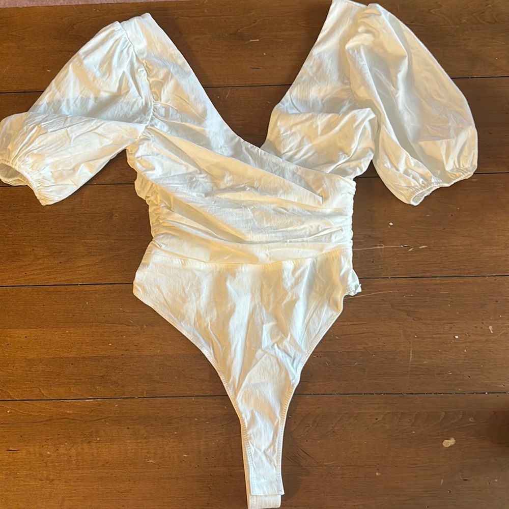 Never been worn bodysuit